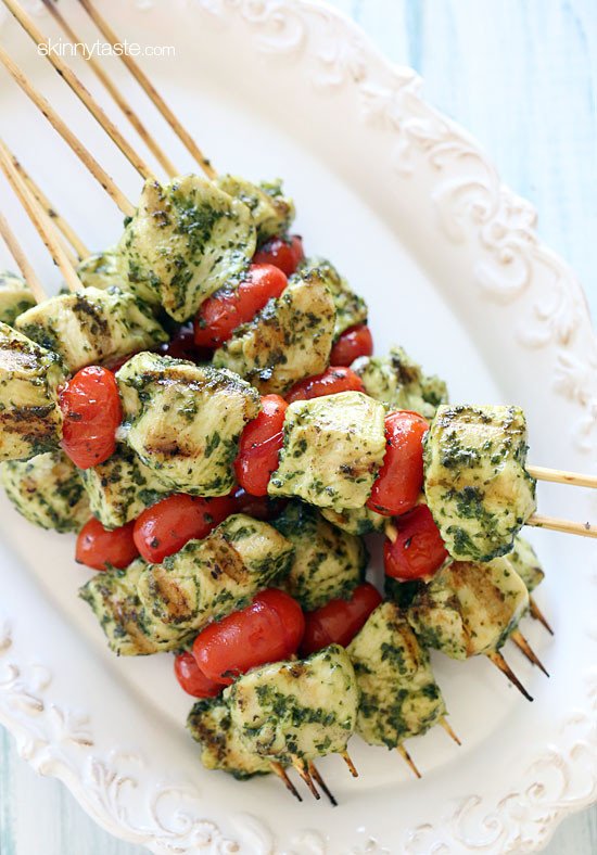 Click here to see Skinnytaste's recipe for Grilled Pesto Chicken and Tomato Kebabs</a