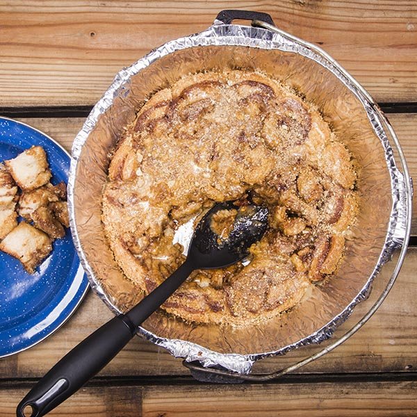 Can't decide between cinnamon and caramel rolls for your camping breakfast? With this super-easy Dutch oven recipe, you can have both!
