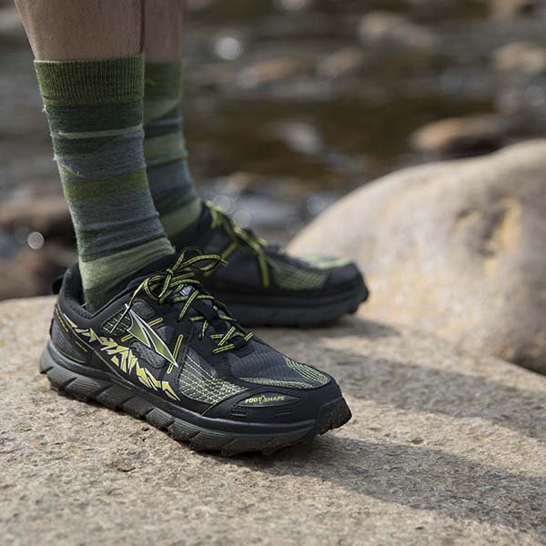 hiker's shoes treading the Appalachian Trail