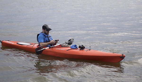Clint texts -- without risking his phone -- from aboard a rented kayak.