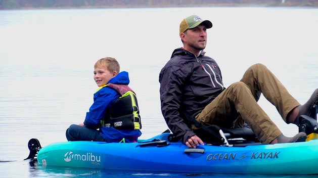 The Last Of The Open Water Young Son Enjoys Fall Kayak Trip