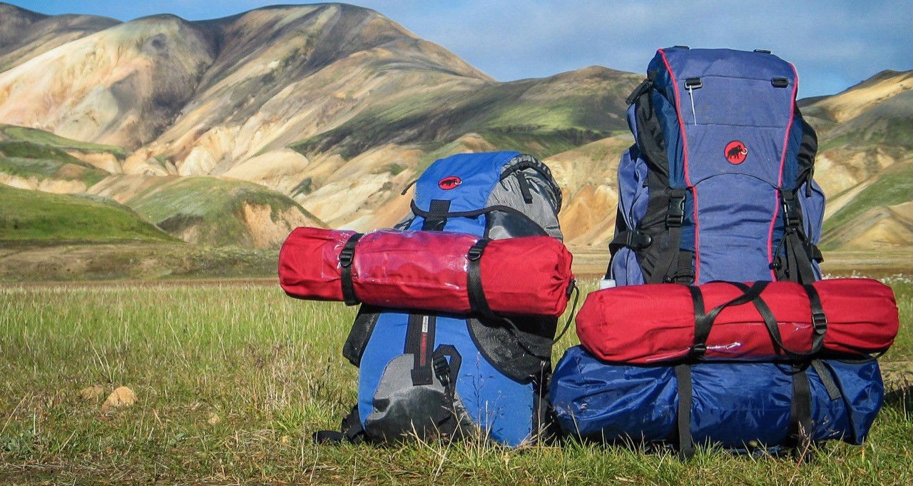 How to attach shop roll mat to rucksack