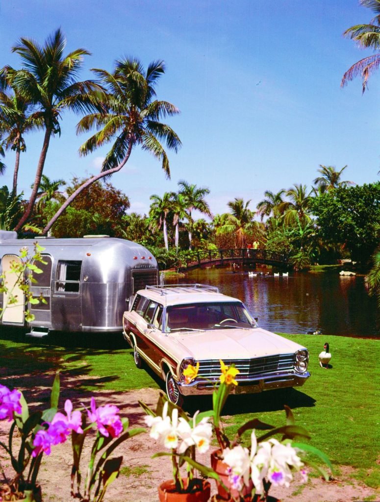 The Ford Country-Squire station wagon was an ideal vehicle for towing Airstream trailers in the 1960s and 1970s. This 1967 model is towing an Airstream through Hawaii. 