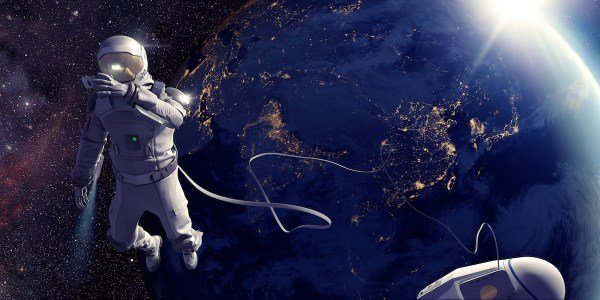 Astronaut On Spacewalk Taking Selfie In Front Of Earth
