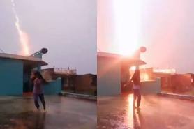 Girl escapes lightning strike India