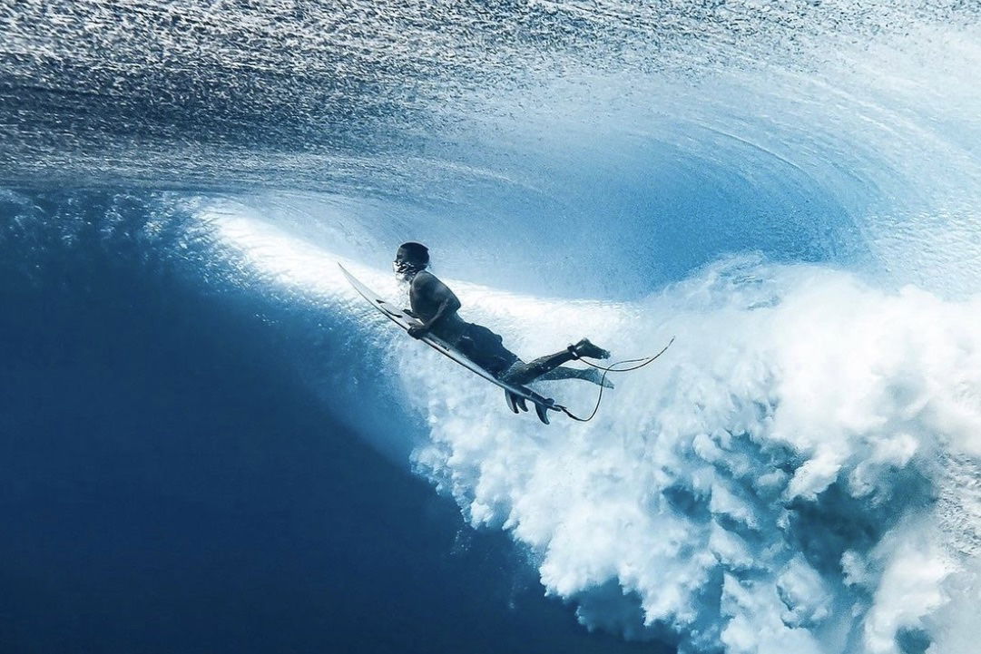 pictures of surfers from underwater